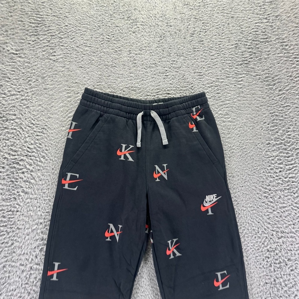 VTG Nike Sportswear Club Sweatpant Boys XL Black All-Over Print Jogger Tapered - Picture 2 of 9